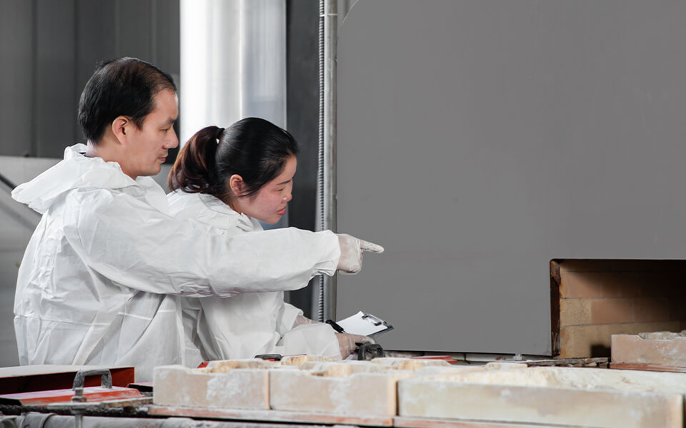 2 engineers carefully checking catalyst adsorbent quality