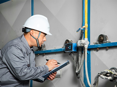 an engineer checking the reactor configuration for a full cycle technical follow up