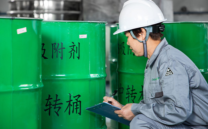 a worker checking the quality of incoming material ensuring the reliable supply chain management